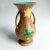 Two-handled vase amphora, decoration of green leaves and signed santucci deruta
