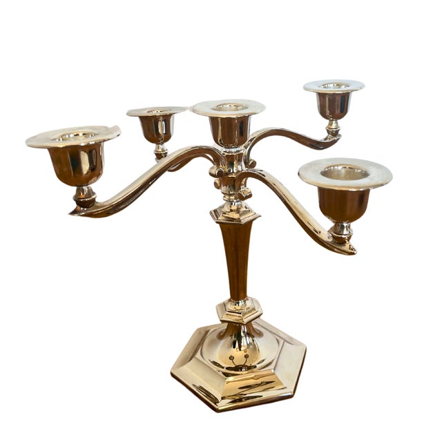A striking French Art Deco candelabra from the 1920s, crafted in silver-plated metal. This elegant five-light piece...
