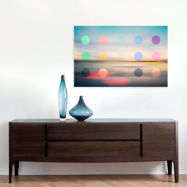 Cameron's unique seascape fine art is more modern with colourful dots added with symmetry. The vintage hues add a warth...