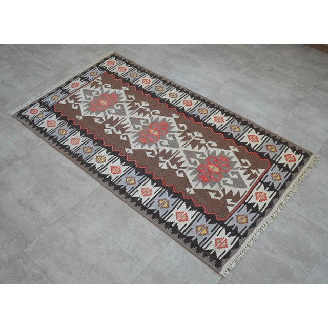 Dimension: 36" x 66" Material: The original rug is made of wool on wool. 80% colors are sheep's own color. No DYES...