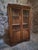 This French display cabinet dates from the period between 1930 and 1950. It is made of beech and fitted with two glazed...
