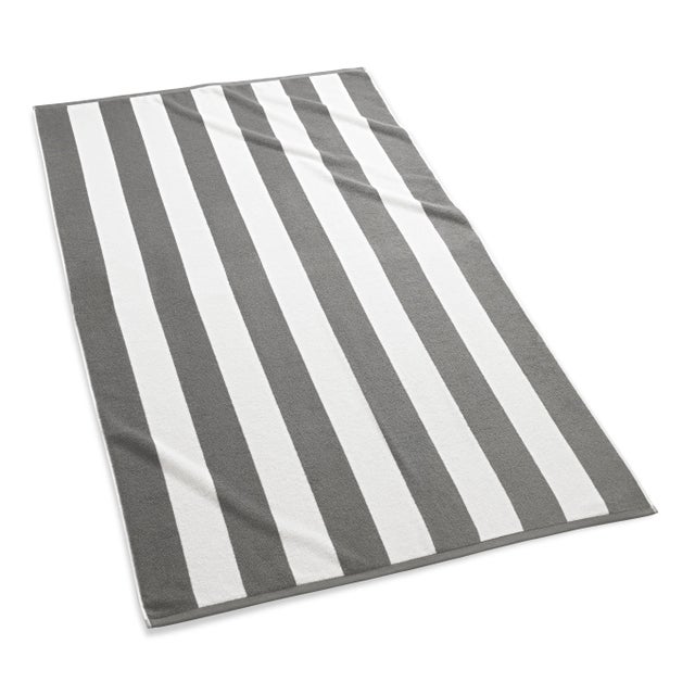 Indulge in the softness of our generously sized Cabana Stripe Beach Towels. Crafted with luxurious 100% long staple...