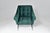 A masterfully restored Italian Mid-Century Modern armchair designed by typical angular seating and slim played and tapered...