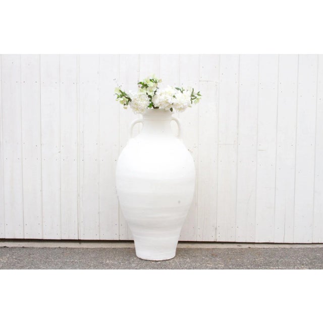 Greek clay pot that was handcrafted by skilled artisans to have a thick rolled rim and two handles on each side. Ready to...