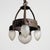 A rare and early swedish jugend ceiling lamp in patinated and iron with four decorative and sculptural frosted glass...