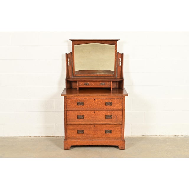A gorgeous antique Mission, Arts & Crafts, or Art Nouveau period four-drawer vanity dresser or chest of drawers with...