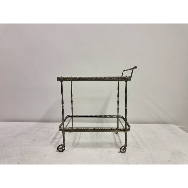 French Silvered Drinks Trolley, 1960s A finely made French drinks trolley from the 1960s, constructed in silvered metal...