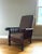 Beautiful early 20th century solid wood Morris style reclining chair. The chair features a slatted backrest with a solid...