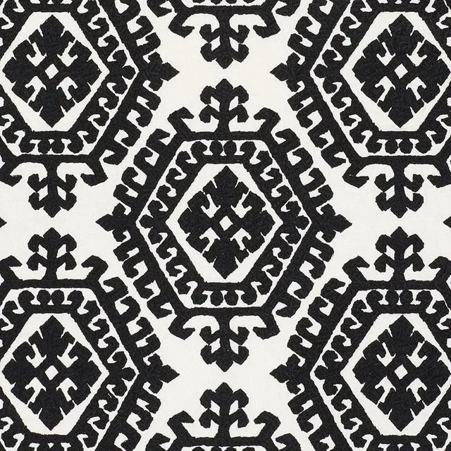 With repeating graphic medallions, this allover embroidery has a visual strength that doesn't overpower because it is...