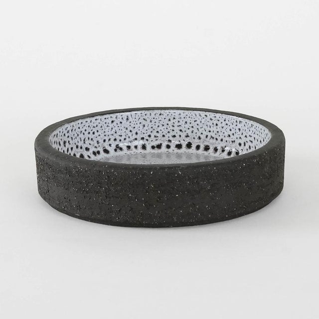 Ceramic bowl manufactured in the 1960s, Danish production. Decorated in shades of gray and white, with characteristic...