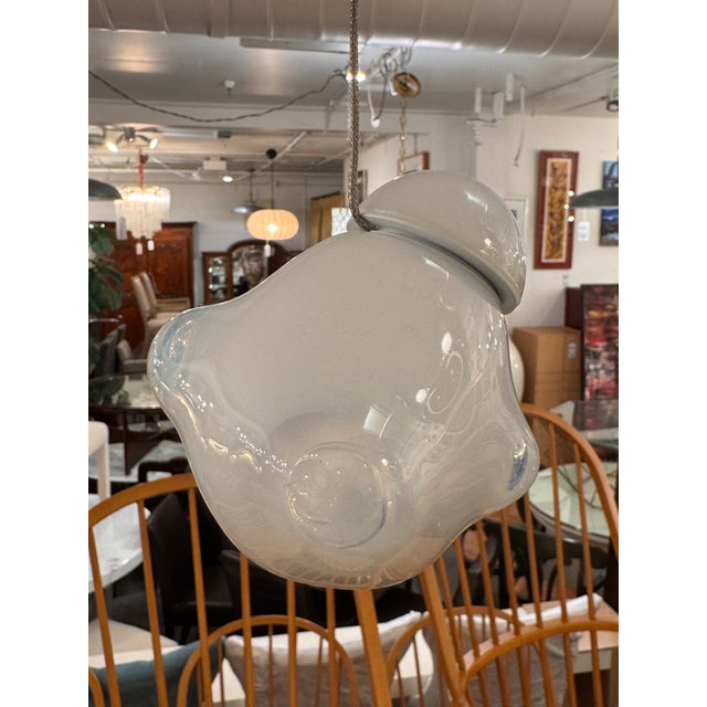 Design Plus Gallery presents the 57.1 Opaline Pendant from Bocci. The single pendant has a blown glass shade in white...