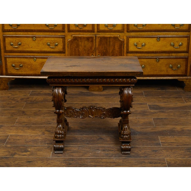 Italian 1800s Walnut Side Table with Lion Motifs and Richly Carved Trestle Base For Sale - Image 4 of 11