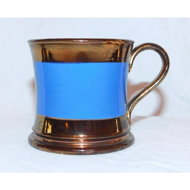 Beautiful copper lustre child's mug with wide cobalt band. A charming, nostalgic collectible!