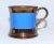 Beautiful copper lustre child's mug with wide cobalt band. A charming, nostalgic collectible!