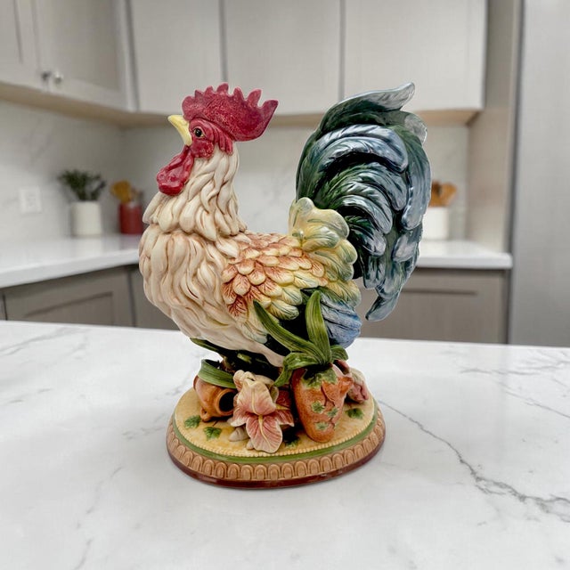 A large hand-painted ceramic rooster figurine by Fitz & Floyd from the Mediterranean collection, featuring a richly...