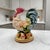 A large hand-painted ceramic rooster figurine by Fitz & Floyd from the Mediterranean collection, featuring a richly...