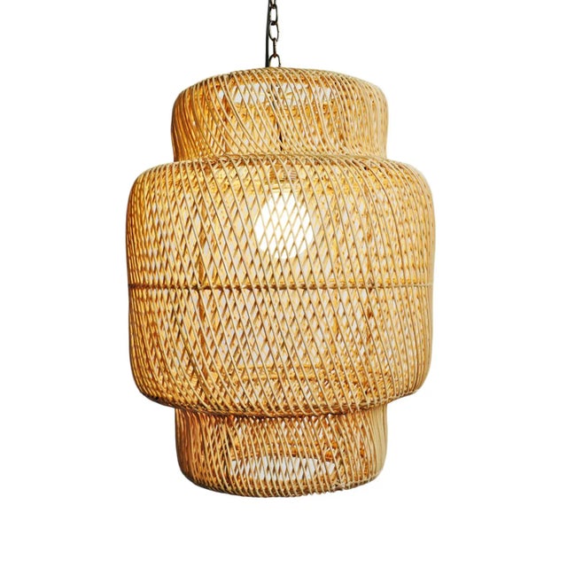 Handsome natural wicker liberty lantern. Classic modern shape with natural fiber warmth. Each may vary in exact natural...