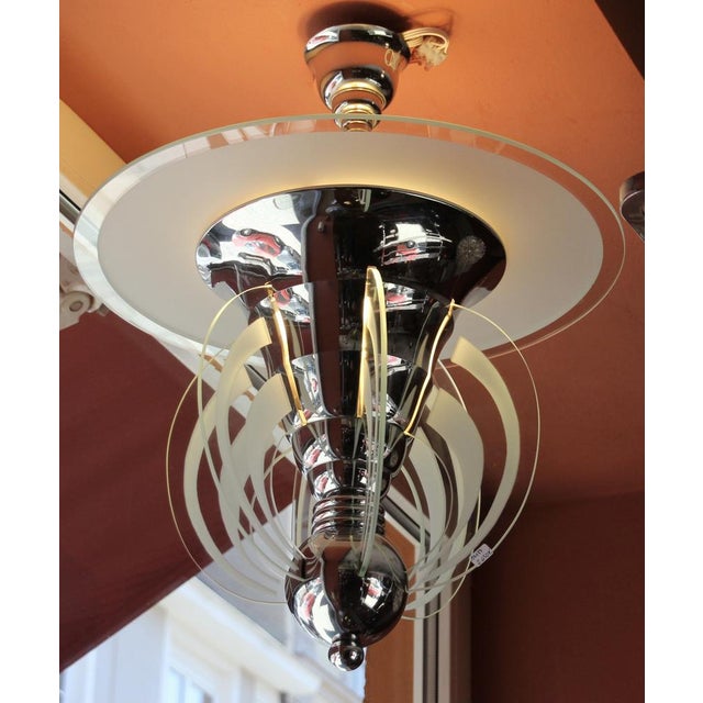 Catalog (see photo): Model 3224 Bronze chandelier, 3 lights, indirect lighting, 60 cm high, 6 arms and disc diameter 480...