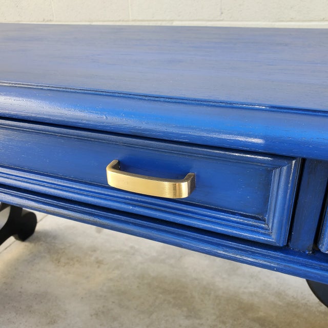 A vintage, Broyhill Premier Division, writing desk painted a luscious dark sapphire blue. The curvy, sculptural legs, and...