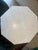 Cool marble round rests on an octagonal pedestal base of hand-applied reeded wood with shimmering antiqued gold finish....