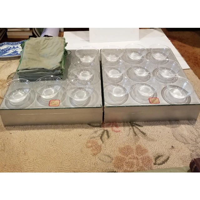 Circa 1900 set of 14 Steuben glass bowls. These are in the original boxes and each bowl has it's own Steuben glass green...