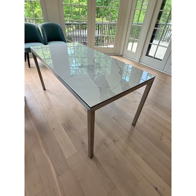 Room & Board Rand Dining Table A simple architectural design that gives the illusion of a floating top. Despite its...