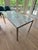 Room & Board Rand Dining Table A simple architectural design that gives the illusion of a floating top. Despite its...
