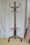 P0322 antique turn of the century bentwood hall stand of half round design, having three scroll coat and hat hooks with...