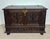Magnificent Spanish blanket chest crafted in richly carved wood with bold Renaissance Revival styling. The chest features...