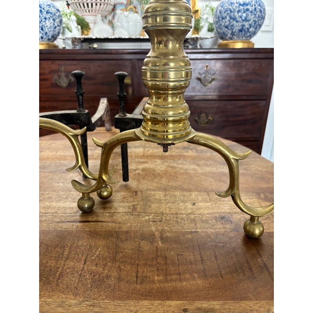 Classic pair of antique heavy brass beehive andirons in original condition. Standing tall with a wide spread at the base.