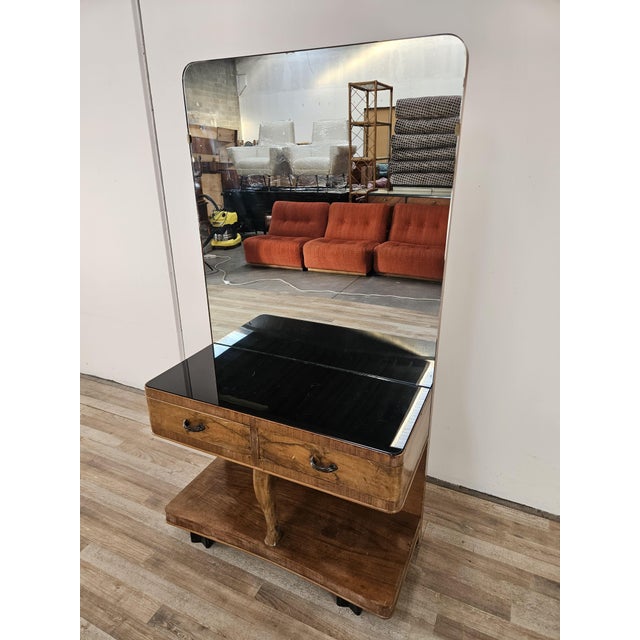 An elegant 1940s Art Deco dressing table with a large, original mirror, perfect for placing in a bedroom entryway,...