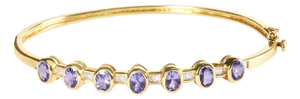 14K Yellow Gold Alternating Bezel Set 5MM Oval Shaped Tanzanite and 1/5 Cttw Diamond Bangle Bracelet