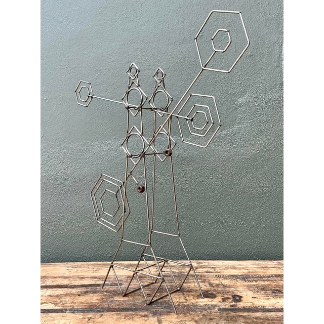 This striking vintage abstract kinetic sculpture embodies the bold, experimental spirit of the Mid-Century Modern and...