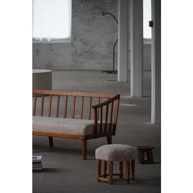 This elegant stool is a fine example of Danish Modern design, crafted by a skilled Danish cabinetmaker in the 1950s. The...