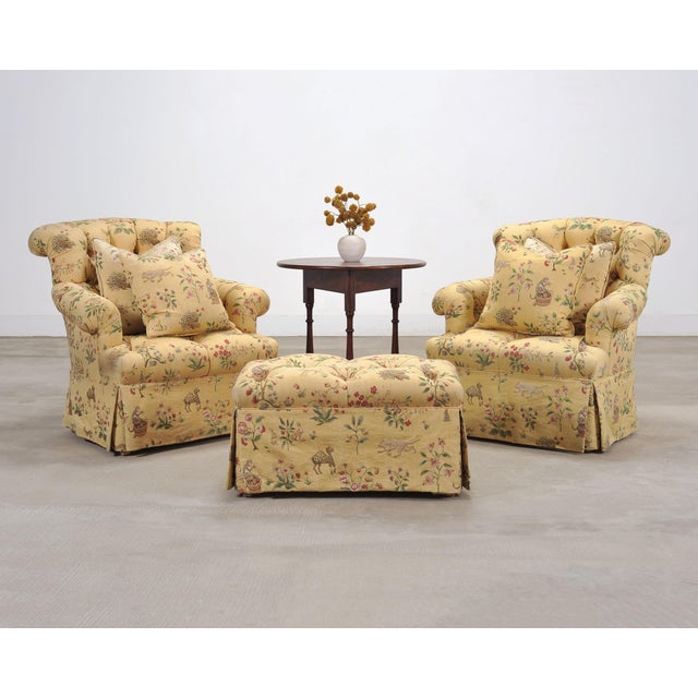 A whimsical bespoke three-piece living room seating group comprised of a pair of English tufted lounge chairs, a matching...