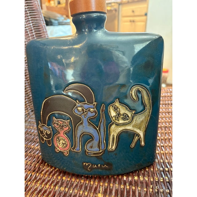 Vintage Handmade Mexican Bottle with Cats signed Mara. This is a beautifully made little pottery bottle with a wood and...