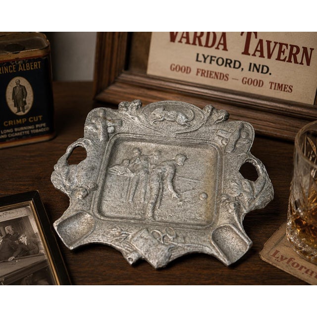 Bring authentic mid-century Americana into your collection with this vintage cast aluminum advertising ashtray from Varda...