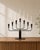 A sculptural seven-arm candelabrum attributed to gunnar ander for ystad-metall, sweden, dating from the mid-century...