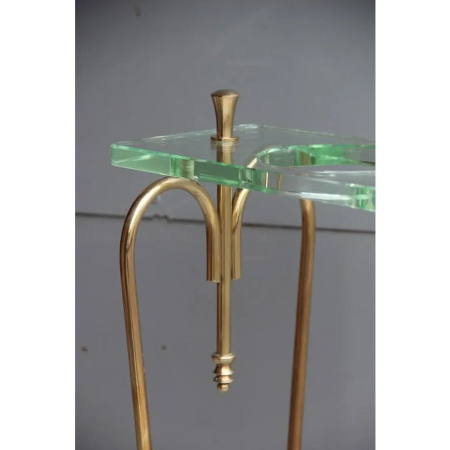 This elegant and refined umbrella holder of Italian design is made of brass that has been polished, and a thick glass...