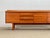 This sideboard is a handcrafted piece from the 1960s, designed by Philip Hussey and made by the renowned cabinet maker...