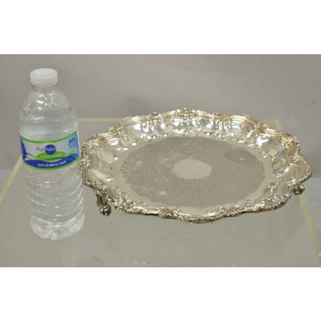 English Silver Mfg Corp Silver Plated 12" Regency Style Scalloped Platter Tray. Item listed is raised on feet, scalloped...