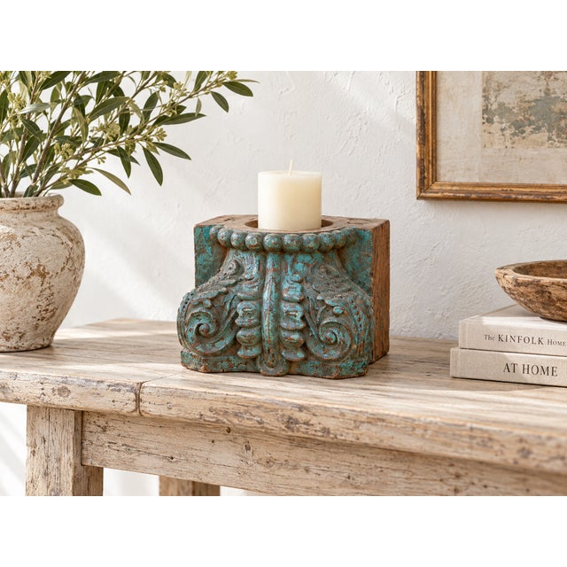 Turquoise is the first thing you see, and the carving holds your eye after that. This antique teak capital is heavily...