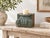 Turquoise is the first thing you see, and the carving holds your eye after that. This antique teak capital is heavily...