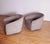 We are pleased to present a pair of Minotti Portofino Swivel Lounge Chairs, designed by the acclaimed Rudolfo Dordoni. A...