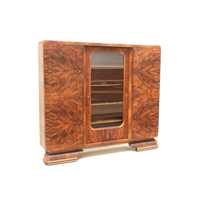 Large vintage burl walnut Art Deco cabinet made in the 1930s. This impressive burl walnut Art Deco cabinet from the 1930s...
