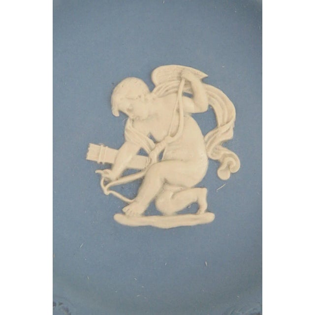 This gorgeous trinket dish is made of Jasperware Ceramic. This small dish is stamped as being made by Wedgwood in England,...