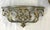 Fancy pair of Hollywood Regency style wall console shelves from the late 20th century. They are made of cast plastic...