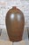 This ceramic vase originates from early 20th-century Czechoslovakia and stylistically bears elements of Art Deco...
