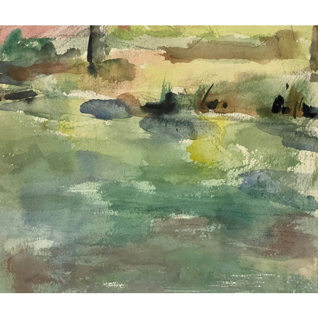 A beautiful and relaxing modern expressionist watercolor depticting a calm lake and rocky shore. Shades of green, blue,...