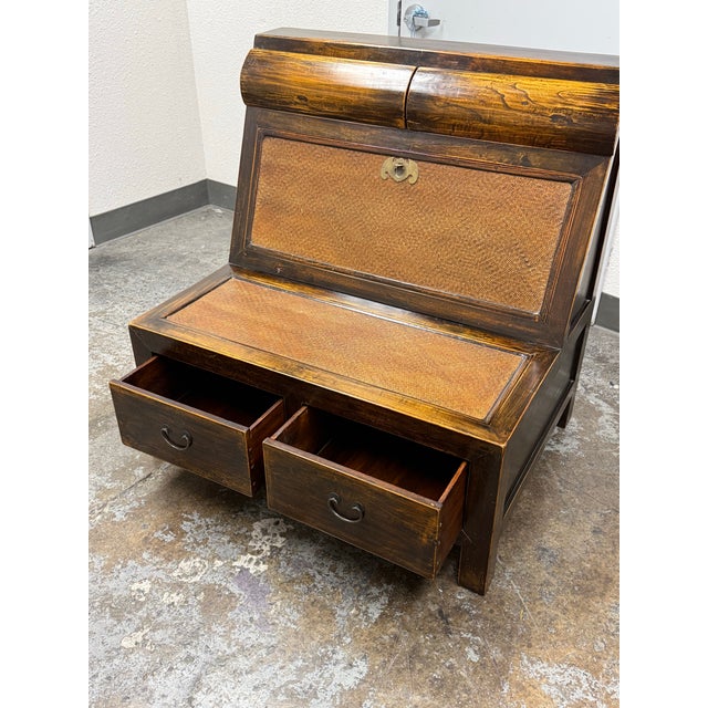 Design Plus Gallery presents a Vintage Asian Wooden Storage Bench. The bench has two rounded upper compartments, two lower...